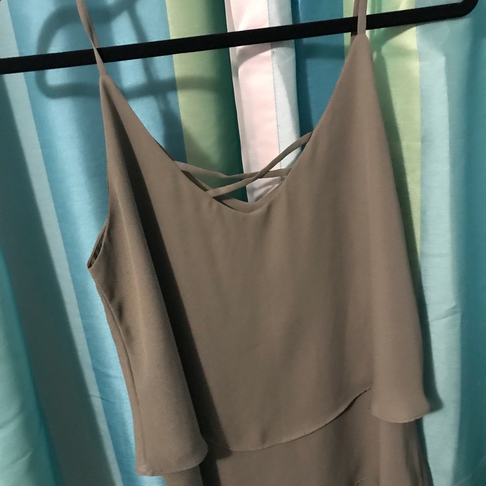 Francesca’s green tank top criss cross detail